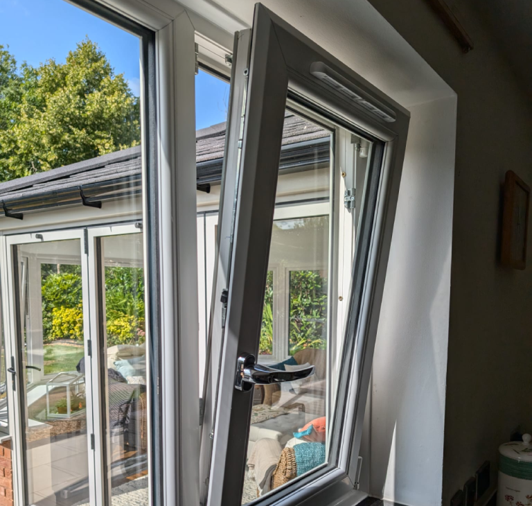 White uPVC Tilt and turn window with chrome handle and trickle vent